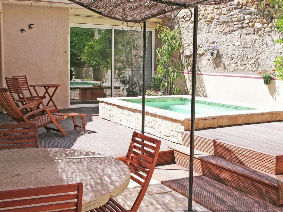 Alluring holiday home in Cazouls Dherault with pool