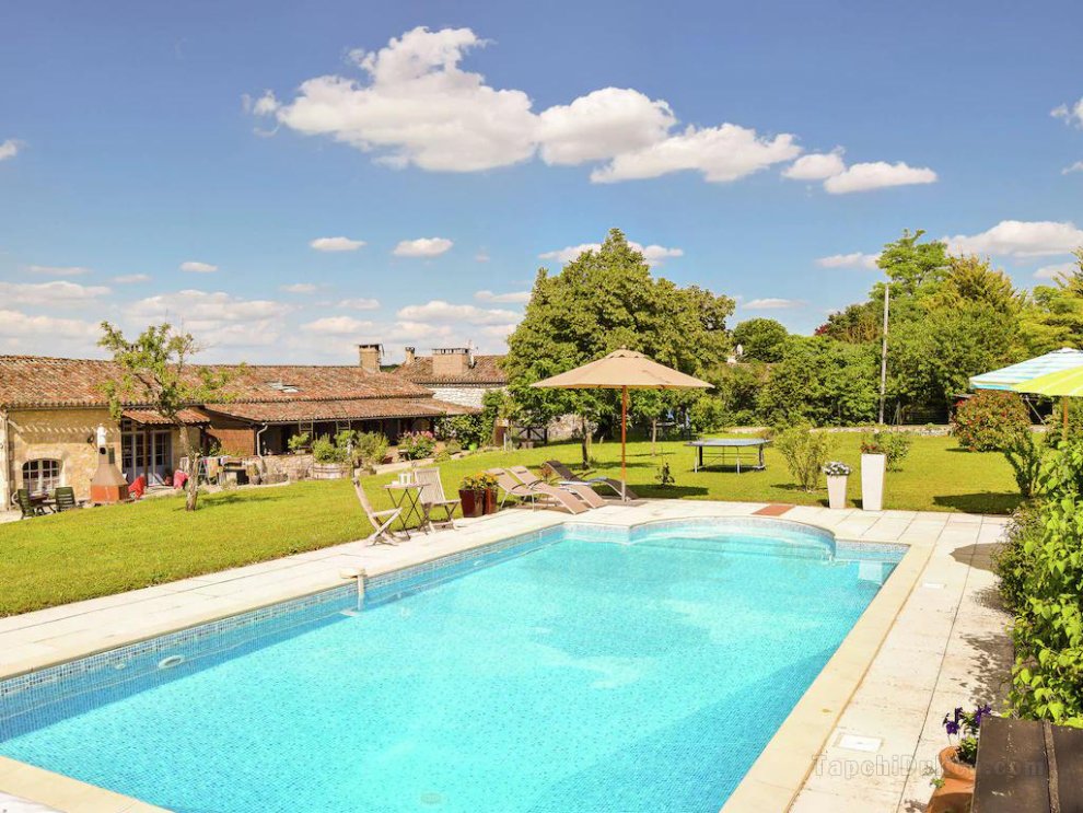 Traditional farmhouse with pool in the middle of the French countryside.