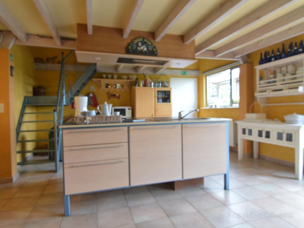 Spacious, stylish holiday home in the centre of forested surroundings, with private garden