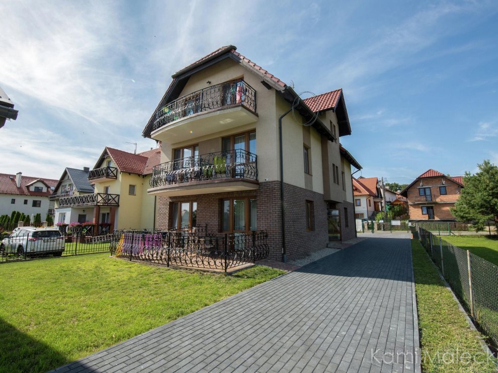 Comfortable apartment in a wooden cabin by the sea in Krynica Morska