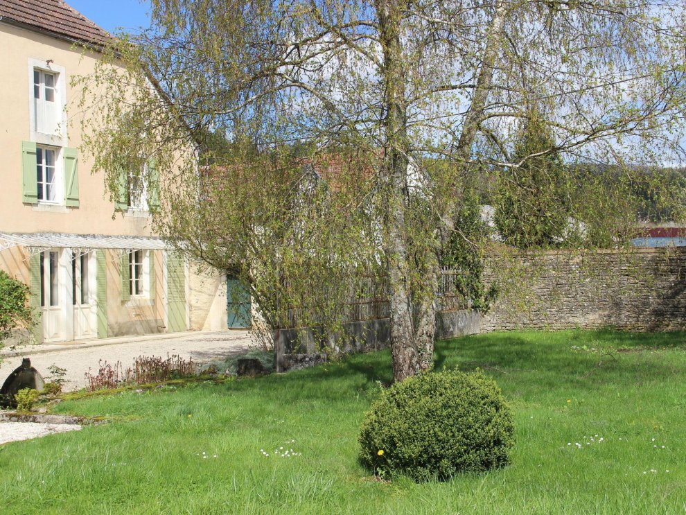 Beautiful country house with enclosed garden in green surroundings in Burgundy.