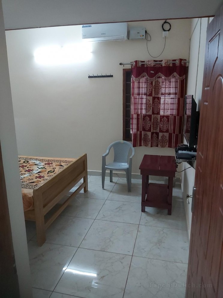 suloram illam  three rooms each with 2,4,5 beds