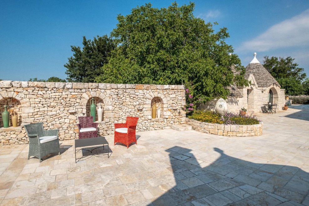 Trulli in ancient farm with pool