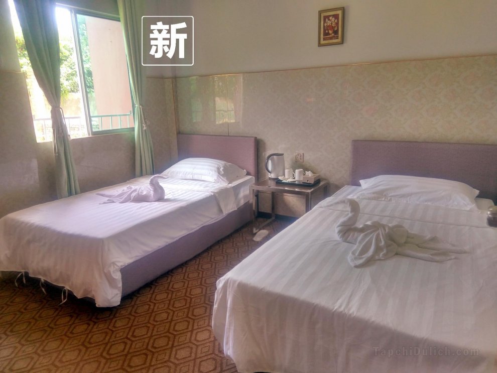 Two single beds roms HUAQIOUHOME Homestay