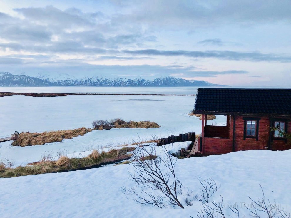 Tiny house cuddled into nature in Husavik offers 